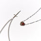 Collier avec pendentif cœur et épée en zircon superposé
